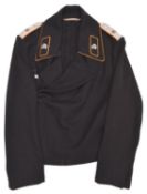 A scarce Third Reich black Panzer jacket, with yellow ochre piping to the collar, collar patches,