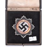 A Third Reich German cross in gold, VGC in case of issue. £475-500