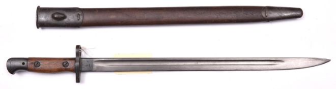 A 1907 pattern SMLE bayonet, by Wilkinson, in its scabbard. GC (dark patina to metalwork with some
