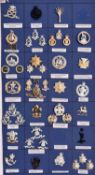 26 mixed Infantry and other mainly anodised cap badges, some with their matching pairs of collar