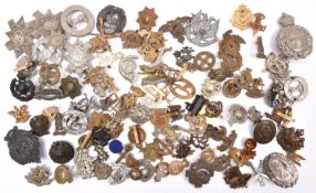 Approximately 100 restrike and copy military cap and other badges. GC £100-150