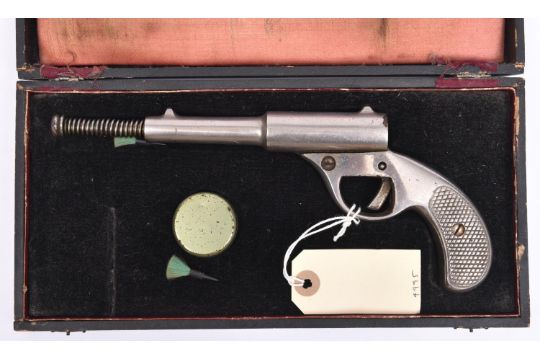 A pre-1933 .177" Dolla pop out air pistol, 9½” overall with barrel out, of nickel plated cast iron