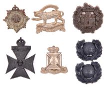5 WWII plastic cap badges: Leicestershire (slightly bent), Essex, Wiltshire, KRRC and RASC, and