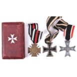 A 1914 Iron Cross 2nd Class; 1914-18 Honour Cross with swords; and grey metal 1939 War Merit Cross