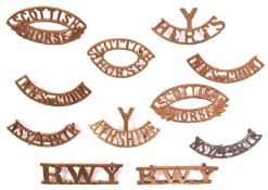 11 Yeomanry OR’s brass shoulder titles: pair of RWY large; pair of Scottish floral type; pair Inns