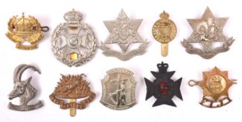 10 Commonwealth OR’s cap badges: T.D.F. Tonga, R Rhodesia Regt QC, West Africa Regt, Fiji Defence