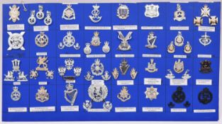 32 mixed Yeomanry, Territorial, London etc.. anodised cap badges, some accompanied by their matching