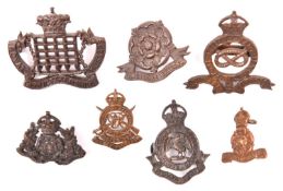Yeomanry Officer’s bronze cap badges: Staffordshire, Royal Bucks Hussars (1 lug missing), Royal