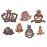 Yeomanry Officer’s bronze cap badges: Staffordshire, Royal Bucks Hussars (1 lug missing), Royal