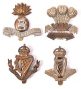 4 pre 1922 OR’s cap badges of Irish Regts: Royal Dublin Fusiliers, Leinster Regt, Royal Irish Regt,