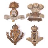 4 pre 1922 OR’s cap badges of Irish Regts: Royal Dublin Fusiliers, Leinster Regt, Royal Irish Regt,