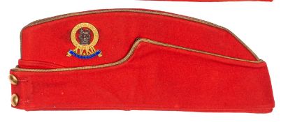 A good Victorian Officer’s scarlet field cap of the 15th Hussars, with fine gilt, silvered and