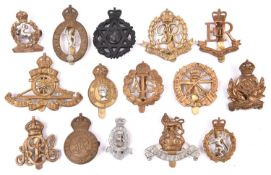 15 Corps and other cap badges, including Intelligence Corps, GRVI Military Police, APC and RAPC,