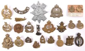 14 various pre 1952 New Zealand cap badges, including chrome plated N.Z. Scottish Regt, N.Z.
