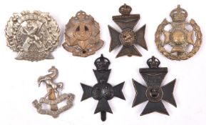 7 cap badges to the London Regiment: 6th, 9th, 10th, 14th, 15/16th, 19th (worn), and 20th. Average