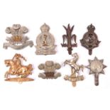 8 Yeomanry cap badges: Welsh Horse bronzed, Surrey WM (1473), Denbighshire Hussars bi-metal (2350),