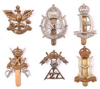 6 WWII war raised Cavalry cap badges: 22nd Dragoons, 23rd Hussars, 24th Lancers, 25th Dragoons, 26th