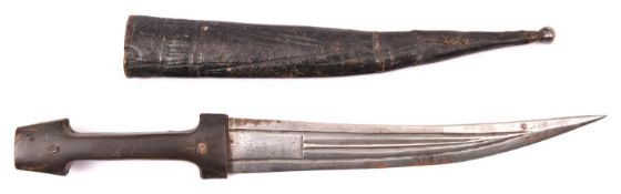 A Caucasian jambiya, 8½” blade of armour piercing form, horn hilt with brass bosses; in its original