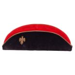 A good Victorian Officer’s tent cap of the 14th Hussars, blue and scarlet body with gilt bullion