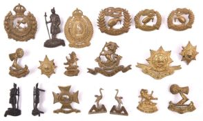 7 New Zealand Infantry cap badges: 1st, 2nd (and pair collars), 3rd (and pair collars), 4th (and