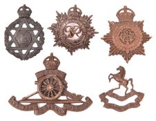 An Officer’s KC bronze cap badge of the 20th London Regt; a Jewish Chaplain”s badge (lugs removed);