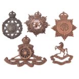 An Officer’s KC bronze cap badge of the 20th London Regt; a Jewish Chaplain”s badge (lugs removed);