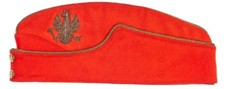 An Officer’s scarlet field cap of the 14th/20th Hussars, gilt bullion embroidered badge, gilt