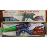 A Japanese plastic & tinplate Double Barrel Space Ray Gun' by 'KO of Japan'. Length 39cm. A tinplate