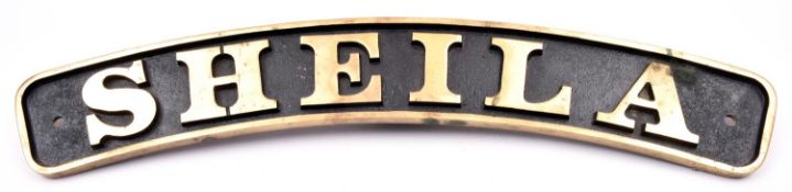 A brass locomotive or traction engine nameplate 'Sheila'. A substantial plate with deeply cast