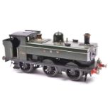 An O gauge coarse scale GWR 57xx 0-6-0PT locomotive for 3-rail running. A kit-built brass loco in