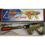 A Japanese Space Pilot Jet Ray Gun. Length 41cm. A Taiyo / KO friction powered plastic gun with