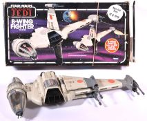 A Kenner Star Wars Return of the Jedi B-Wing Fighter. Boxed with instructions and inner packing