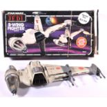 A Kenner Star Wars Return of the Jedi B-Wing Fighter. Boxed with instructions and inner packing