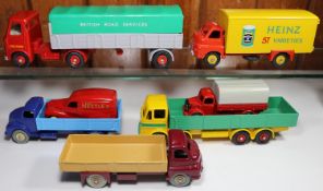 7 well restored Commercial Dinky Toys. Leyland Octopus Wagon in yellow and green with red wheels.