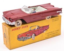 French Dinky Toys Ford Thunderbird Cabriolet (555). An example in a deep red with pale blue