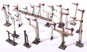 11x O Gauge model railway semaphore signals. Including 7x Bassett Lowke signals; 2x single arm