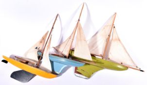 3x Edwardian/early 20th Century pond yachts. All with solid wooden hulls, canvas sails, weighted