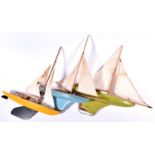 3x Edwardian/early 20th Century pond yachts. All with solid wooden hulls, canvas sails, weighted