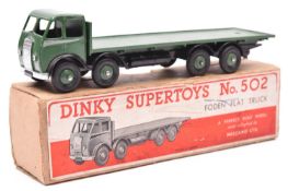 Dinky Supertoys Foden Flat Truck (502). 1st type with DG cab, cab and rear body in dark green with