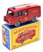 A Matchbox Series Land Rover Fire Truck, Kent Fire Brigade (57c). In red with grey plastic wheels.