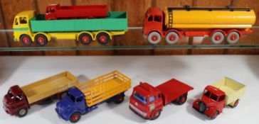 7 well restored Commercial Dinky Toys. Foden FG Petrol Tanker. Cab and chassis in orange with orange