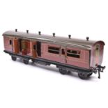 A Gauge One railway Bing LMS Brake Third corridor coach with opening doors. 2783, in lined maroon