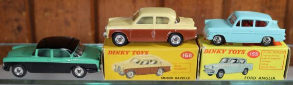 3 Dinky Toys. Ford Anglia (155) in turquoise with red interior. A Singer Gazelle (168) in cream