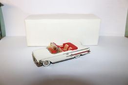 Conquest Models No.2 1960 Chevrolet Impala convertible. In Ermine White with red interior. Boxed.