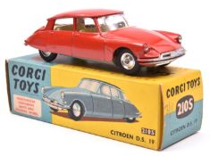 Corgi Toys Citroen D.S. 19 (210S). Example with suspension, in bright red with yellow interior,
