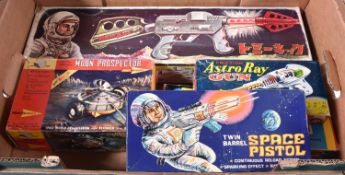 5 Japanese/Hong Kong/Chinese space guns. Japanese Friction Astro Ray Gun. In clear orange plastic