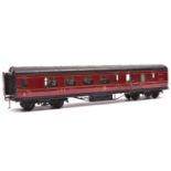 An O gauge LMS corridor coach by Exley. A Brake First in lined maroon livery. QGC-GC, some running