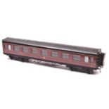 An O gauge LMS corridor coach by Exley. A Full Third, 2211, in lined maroon livery. QGC-GC, some