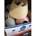 A box of misc including table lamps, Tena pads, etc.