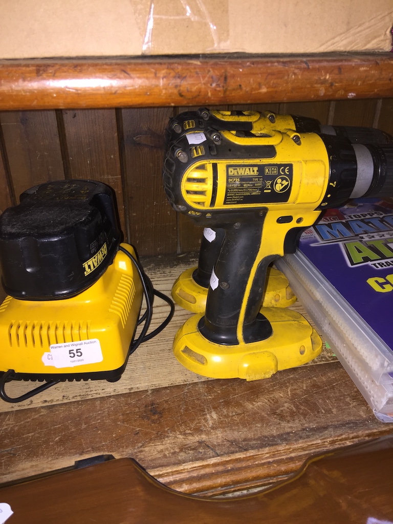 Two cordless Dewalt drills with 1 battery and a battery charger
